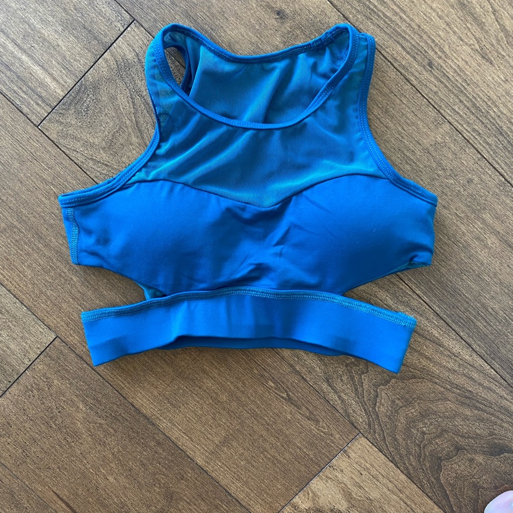 Gorgeous bra with side cutouts. Worn once. Removable cups included!